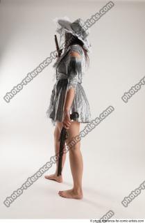 LUCI_AVIOL STANDING POSE WITH TWO GUNS 